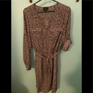 Woman’s black and white patterned dress